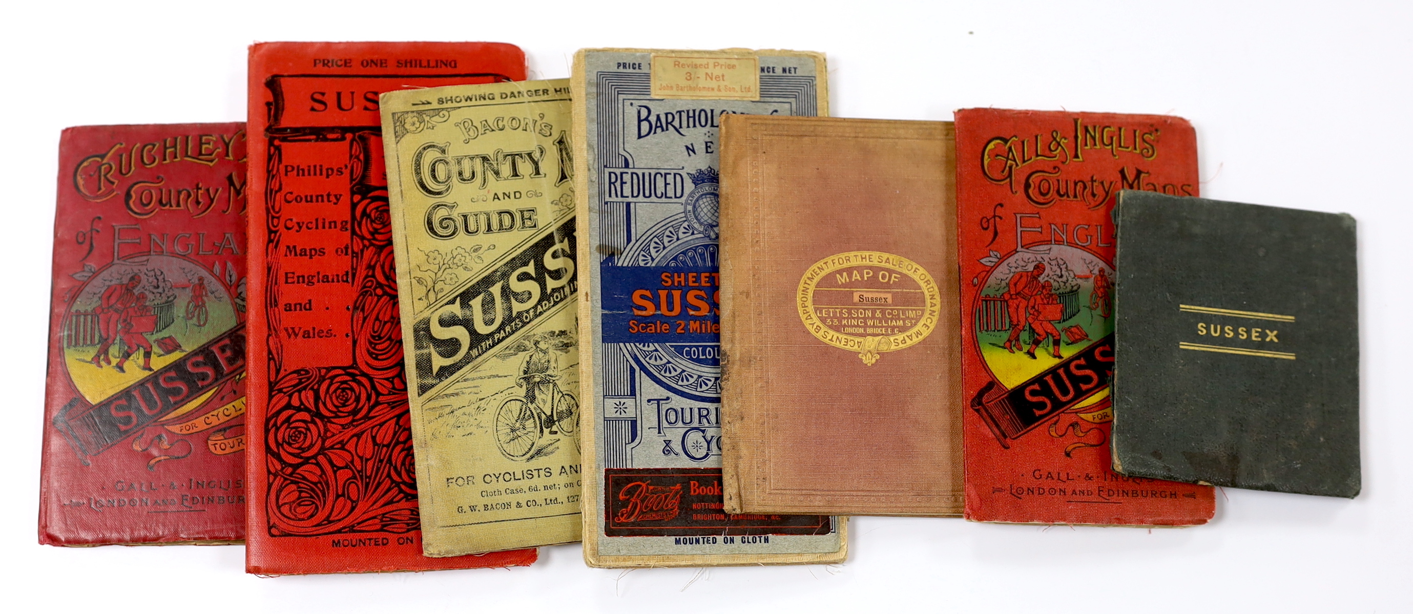 Seven 19th and 20th century folding maps of Sussex; a Pocket County Map series, pub. Chapman and Hall, a Cruchley’s County Map, a Gall & Inglis County Map, a Letts Son & Co. map, a Bacon’s County Map, a Bartholomew’s map